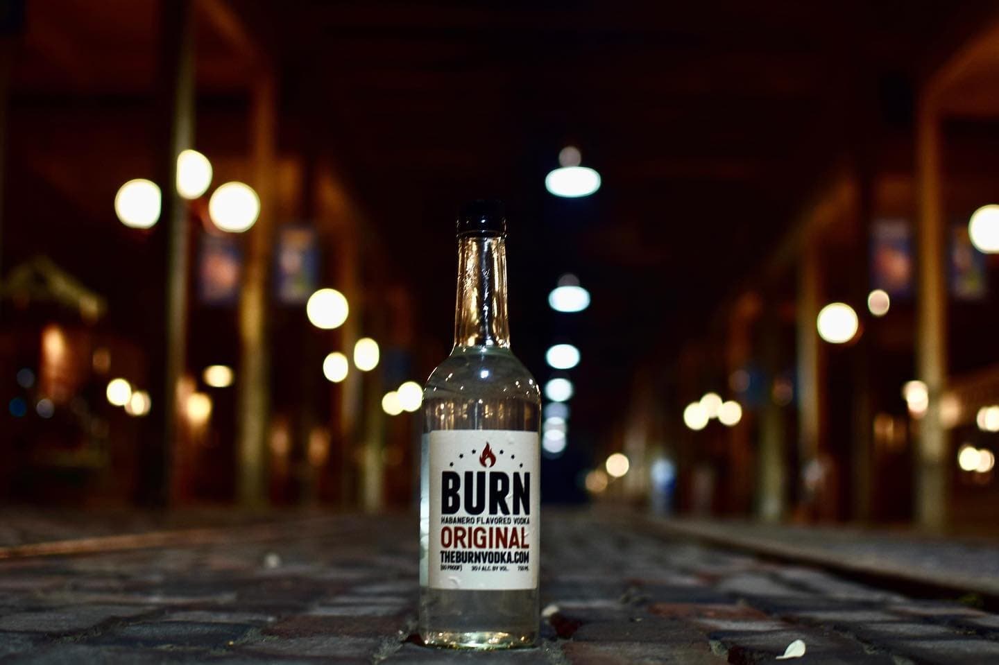 An original BURN bottle under the lights in Lubbock